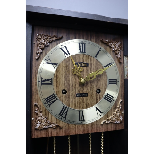 735 - Mid Century Acctim 30 Day Wall Clock complete with key and pendulum Chime works but does not seem to... 