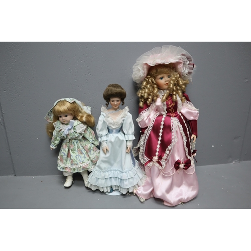 850 - Three Vintage Porcelain Dolls to include one Named “Sandra Kuck”