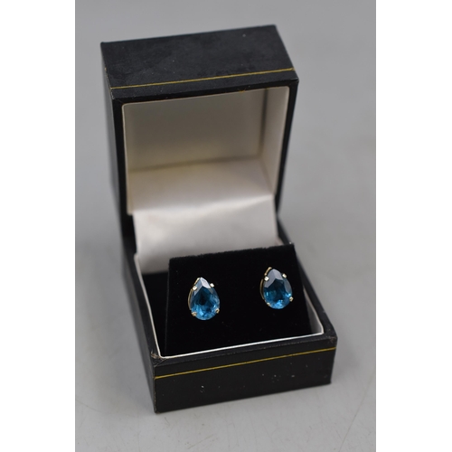 27 - Pair of Mexican 10ct Gold Blue Stoned Stud Earrings. Complete with Presentation Box