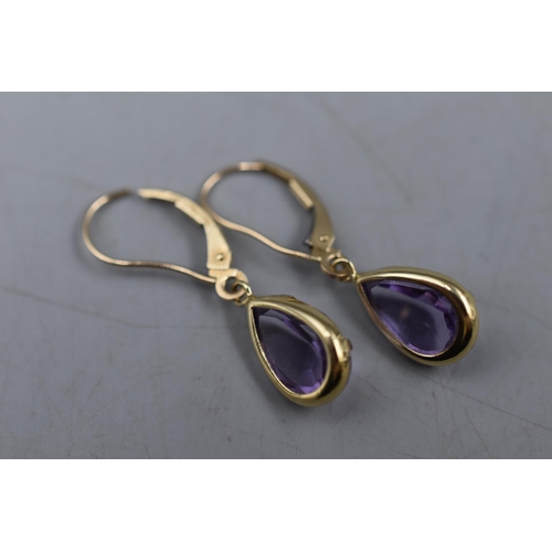 39 - Pair of 10ct Mexican Gold Drop Earrings with Purple Stone. Complete with Presentation Box.