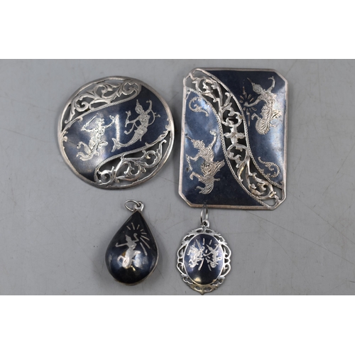 42 - A Selection of Siam Silver Niello Jewellery. Includes Two Pendants and Two Brooches