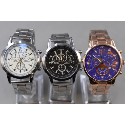 99 - A Selection of Three Quartz Chronograph Style Watches On Stands. Includes Fulaida, and Modiya