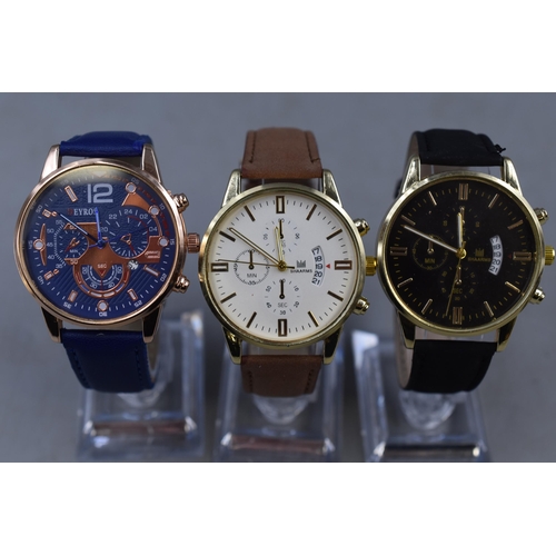 106 - Three Quartz Chronograph Style Watches on Stands. Includes Deyros and Shaarms