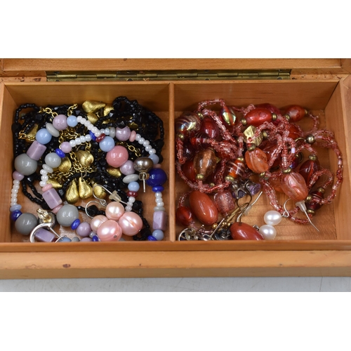 122 - Decorative Wooden Box to include a Selection of Jewellery items. Includes Silver