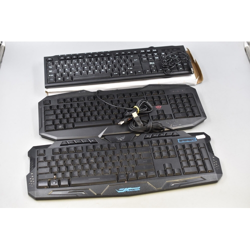 588 - Three Gaming Keyboards to include Rii, Trust GXT and Magic Wings Gamer Keyboard (Untested)