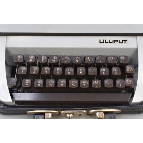 591 - A Portable Lilliput Typewriter, In Case