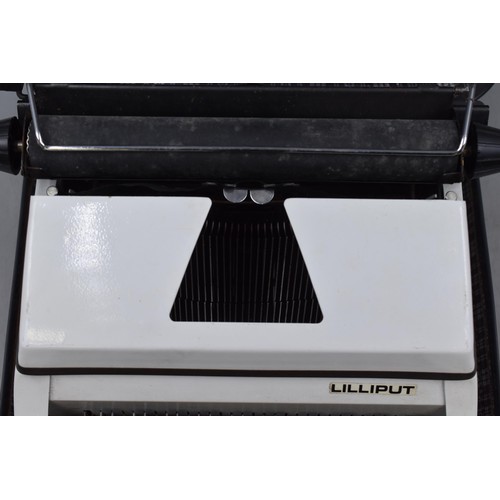 591 - A Portable Lilliput Typewriter, In Case