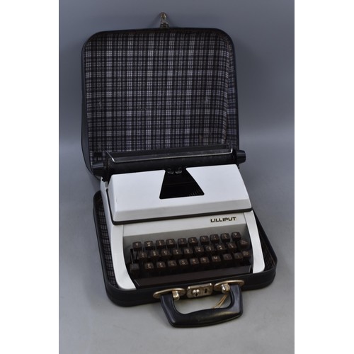 591 - A Portable Lilliput Typewriter, In Case