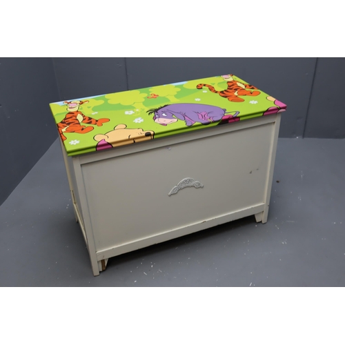 600 - A Winnie The Pooh Children's Toy Chest/Bedding Box. Approx 18