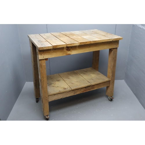 620 - Home made sturdy rough wood bench with locking castors 44