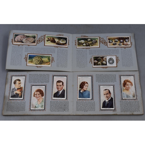 207 - Six Albums of Wills Cigarette Cards including Our King & Queen, Wild Flowers, The Sea-Shore, Rad... 