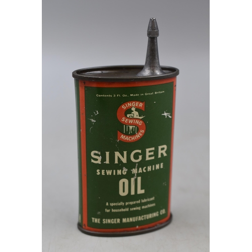 213 - A 3 Fl Can of Vintage Singer Sewing Machine Oil, With Oil Inside (Not Full)