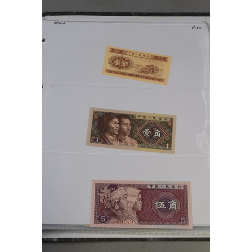 236 - Folder Containing a Large Selection of Worldwide Uncirculated Bank Notes. Includes Mongolia, Ukraine... 