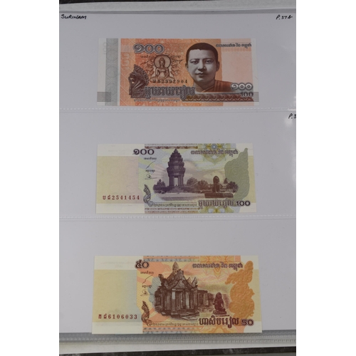 236 - Folder Containing a Large Selection of Worldwide Uncirculated Bank Notes. Includes Mongolia, Ukraine... 