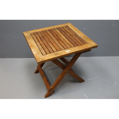 645 - Folding hardwood table measures 19