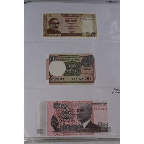 237 - Folder Containing a Large Selection of Worldwide Uncirculated Bank Notes. Includes Cambodia, Banglad... 