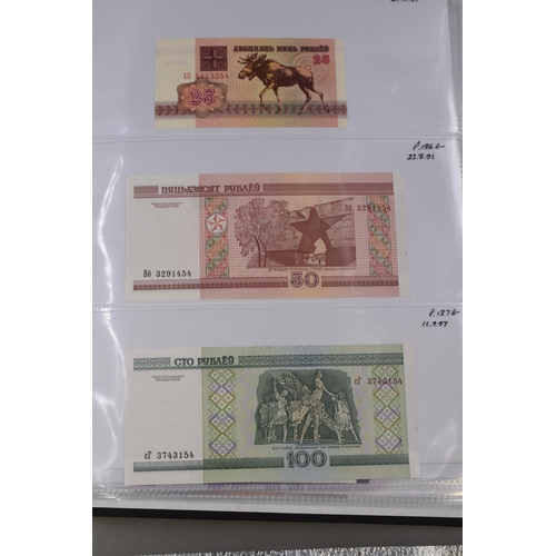 237 - Folder Containing a Large Selection of Worldwide Uncirculated Bank Notes. Includes Cambodia, Banglad... 