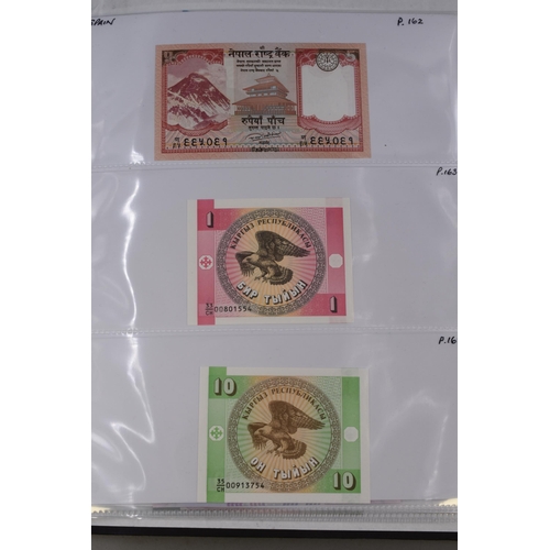 237 - Folder Containing a Large Selection of Worldwide Uncirculated Bank Notes. Includes Cambodia, Banglad... 