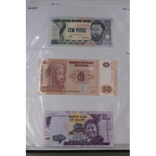 237 - Folder Containing a Large Selection of Worldwide Uncirculated Bank Notes. Includes Cambodia, Banglad... 