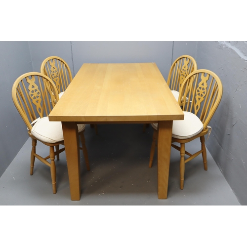 660 - Solid oak dining table with detachable legs measures 62