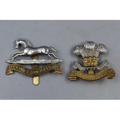 264 - The 10th Royal Hussars Prince of Wales Own and a 3rd Kings Own Hussars Cap Badges