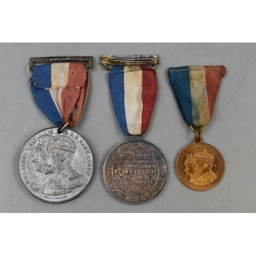 268 - George V Daily Mail Teddy Tail League 1935 Medallion, and two George V 1911 Coronation Medals all wi... 