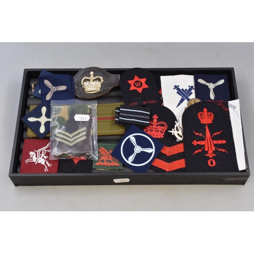 274 - A Large Selection of Military Badges, Patches and NCO Wristband. Includes Vigilance Badge, RAF Patch... 