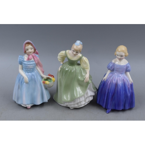 318 - Three Royal Doulton Porcelain Figures, 'Wendy HN 2109', 'Marie HN 1370', And 'Fair Maiden HN 2211'. ... 