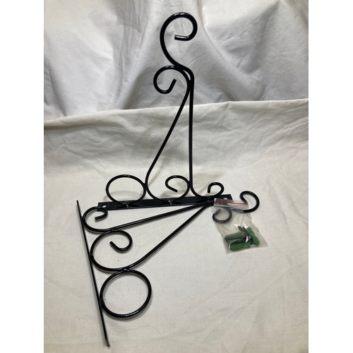 725 - Three pairs (six in total) of black, decorative, hanging basket brackets, 8