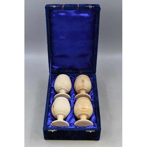 332 - A Set of Four Marble Effect Goblets, In Blue Velvet Case