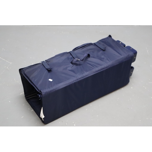 390 - Blue Folding Travel Cot