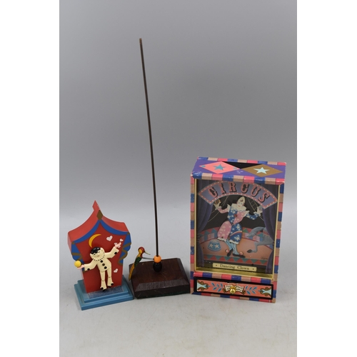 414 - Two vintage dancing clown music boxes one by Swiss manufacturer Reuge (La Matchiche) and one dancing... 