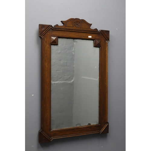 441 - Vintage bevelled wooden wall mirror measures 34