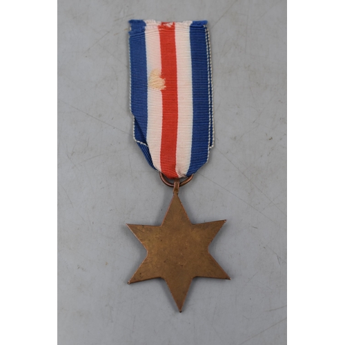 271 - World War II France and Germany Star complete with Ribbon