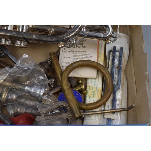 497 - Cornet with selection of brass instrument parts, tuning forks, music stand and more.