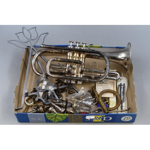 497 - Cornet with selection of brass instrument parts, tuning forks, music stand and more.