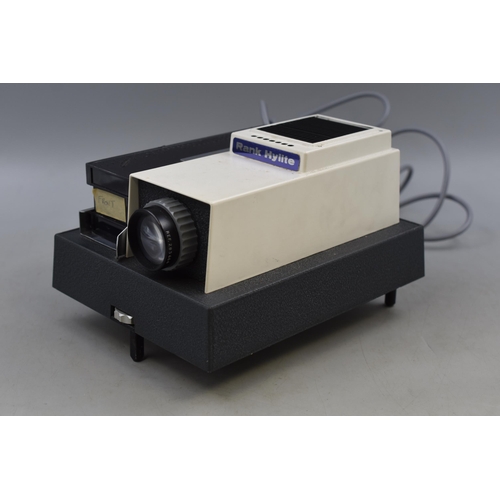 518 - Rank Hylite slide projector in good condition, Fan runs and lamp operates when tested