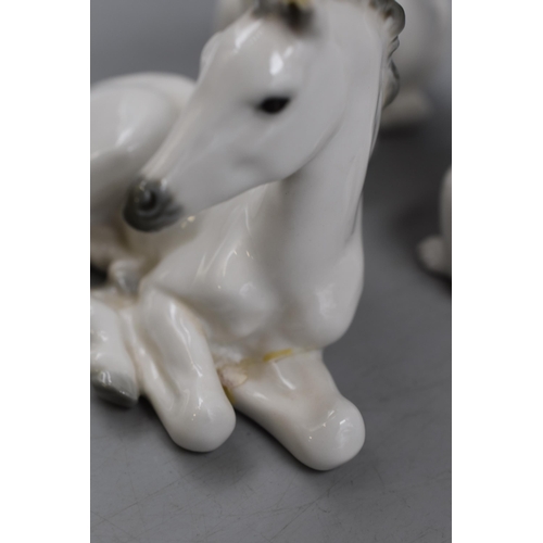 330 - Collection of Ceramic Animal Statues to include Polar Bear, Otter and horse a/f