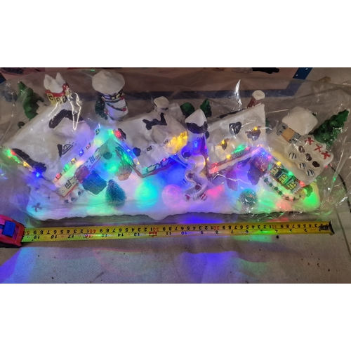 580 - Two Boxed Christmas Items Includes Premier Large Lit Village Scene and a Large Figures12 Piece Delux... 