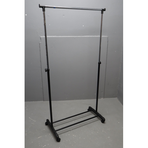 587 - A Black and Chrome Adjustable Clothing Rail on Castors, Approx 35