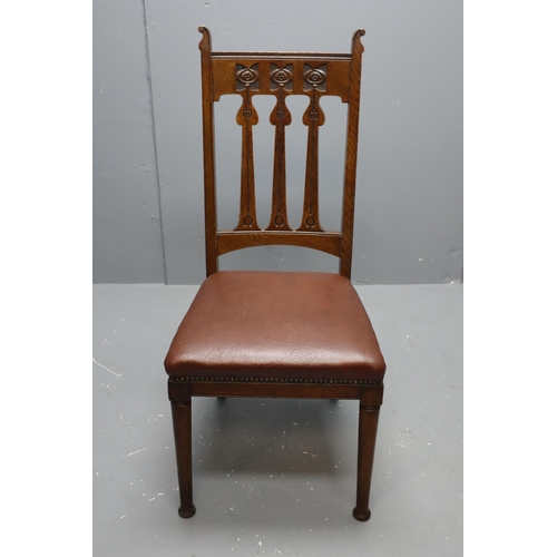 605 - Set of four Art Nouveau, oak, high back dining chairs.