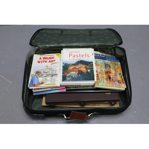 775 - A Selection of Artists Supplies and Books, In Globe Trotter Suitcase. Includes Water Colour Paper, F... 