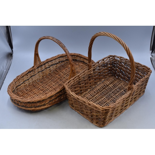 642 - Two Flower Baskets (19” x 10” x 3” and 14” x 10” x 5”)