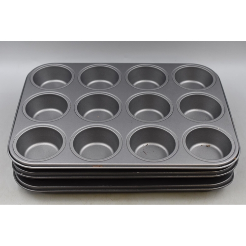 730 - Baking equipment to include yorkshire pudding trays, muffin tray, cake tins and an oven tray plus a ... 