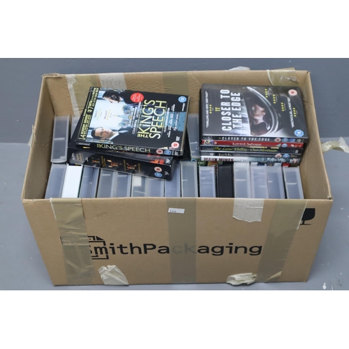 813 - Quantity of video tapes and DVDs (many still sealed) to include Pirates of the Caribbean box set, Lo... 