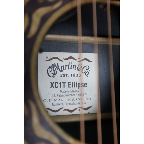 509 - A Martin & Co XC1T Ellipse Cut Away Electro-Acoustic Guitar, With Case and Strap