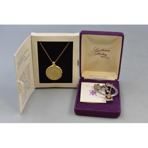 70 - Two items to include Balmoral Motif Brooch in Box and a Guardian Angel Coin Pendant in Presentation ... 