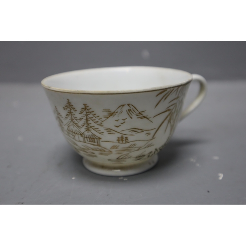 413 - A Forty Piece Japanese White and Gold Gilt Geisha Girl Tea and Dinner Service Depicting Mount Fuji.