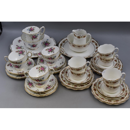 418 - Two Tea Sets each to include 6 Cups, 6 Saucers, 6 Side Plates, Sugars Bowls, Creamers and Sandwich P... 