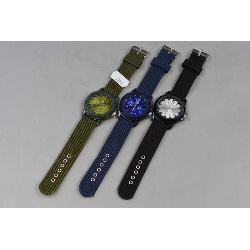 136 - Three gents military style watches in blue green and black all new.